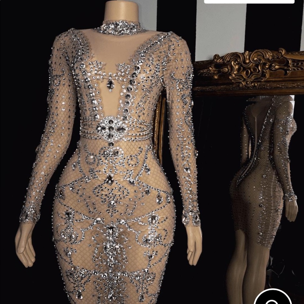 Mesh with rhinestones all over it very see though